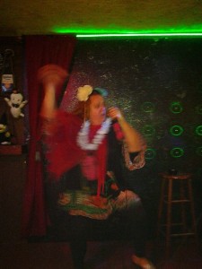 This terribly blurry shot of me singing karaoke was taken with an older model Samsung Android. My friend who took it even used the flash, but even that did not provide nearly enough light to get a sharp image. Oh well.